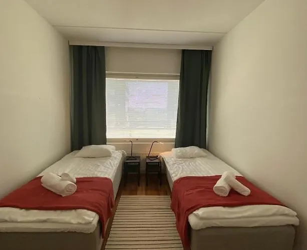 Kotimaailma - Saunallinen Kolmio Laehellae Lentokenttaeae *